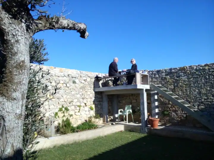 The garden terrace to have lunch with a sea view